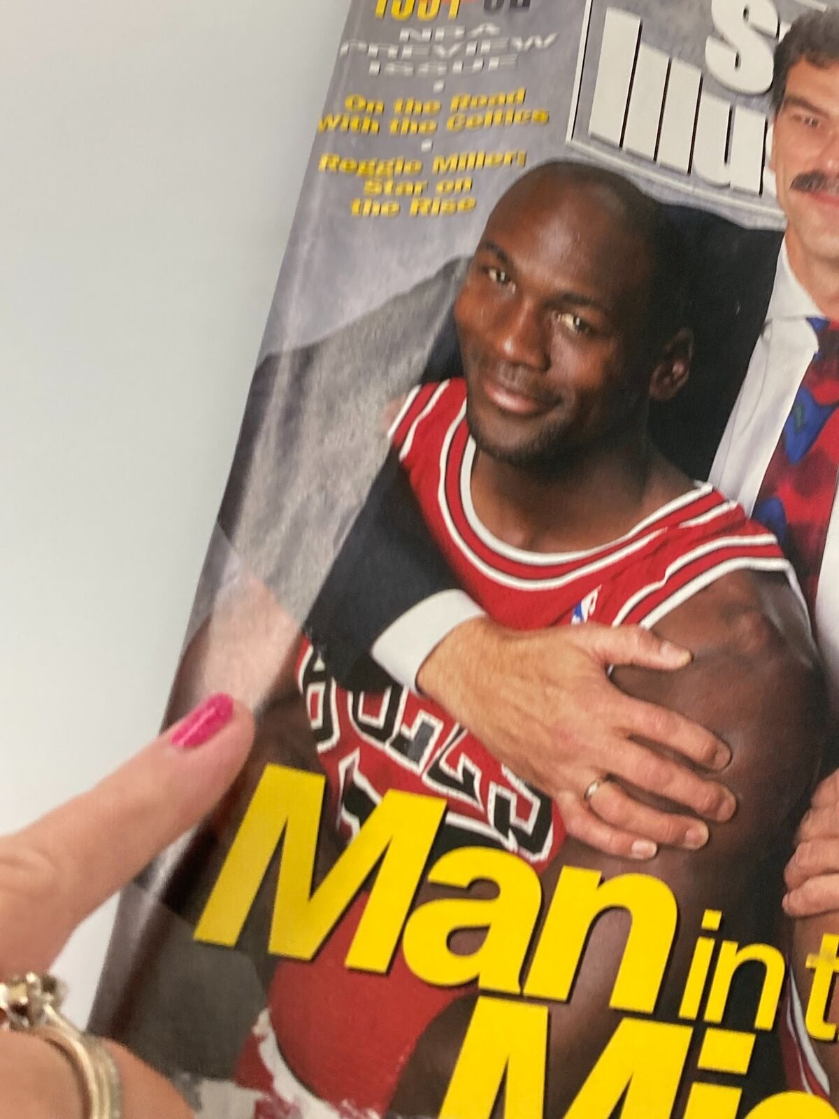 Close-up view of the Sports Illustrated Magazine cover from November 11, 1991, highlighting Michael Jordan with the title 'Man in the Middle'.