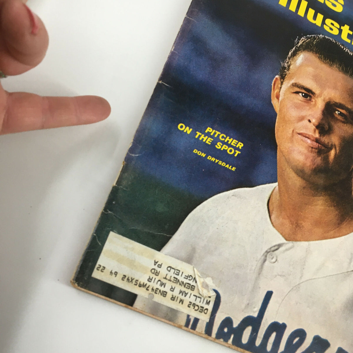 Close-up view of the VTG Sports Illustrated Magazine August 20 1962 cover showcasing Don Drysdale, emphasizing the headline 'Pitcher on the Spot'.