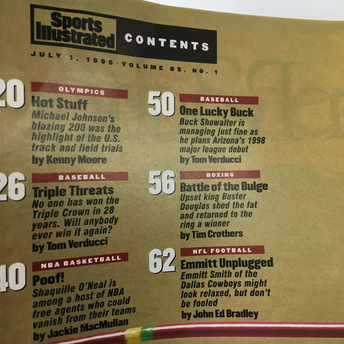 Contents page of Sports Illustrated Magazine, July 1, 1996, listing features including 'Emmitt Unplugged' with an article on Dallas Cowboys player Emmitt Smith.