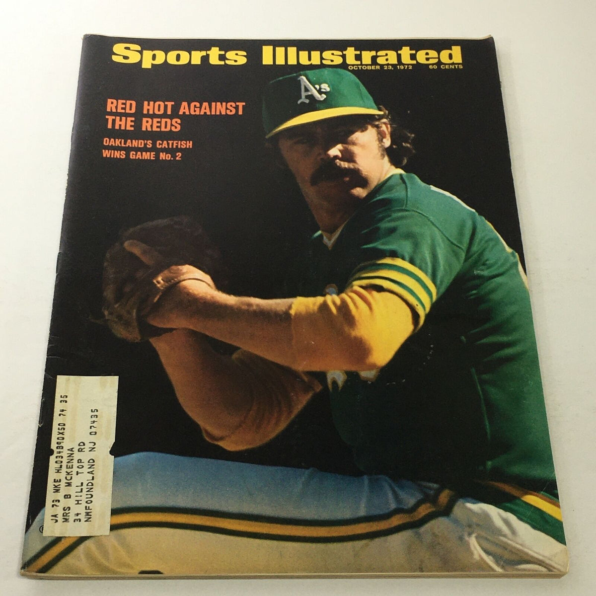 Sports Illustrated cover from October 23, 1972, featuring a pitcher in an Oakland Athletics uniform, titled 'Red Hot Against The Reds Oakland's Catfish'. The magazine highlights Catfish Hunter's performance in the World Series.