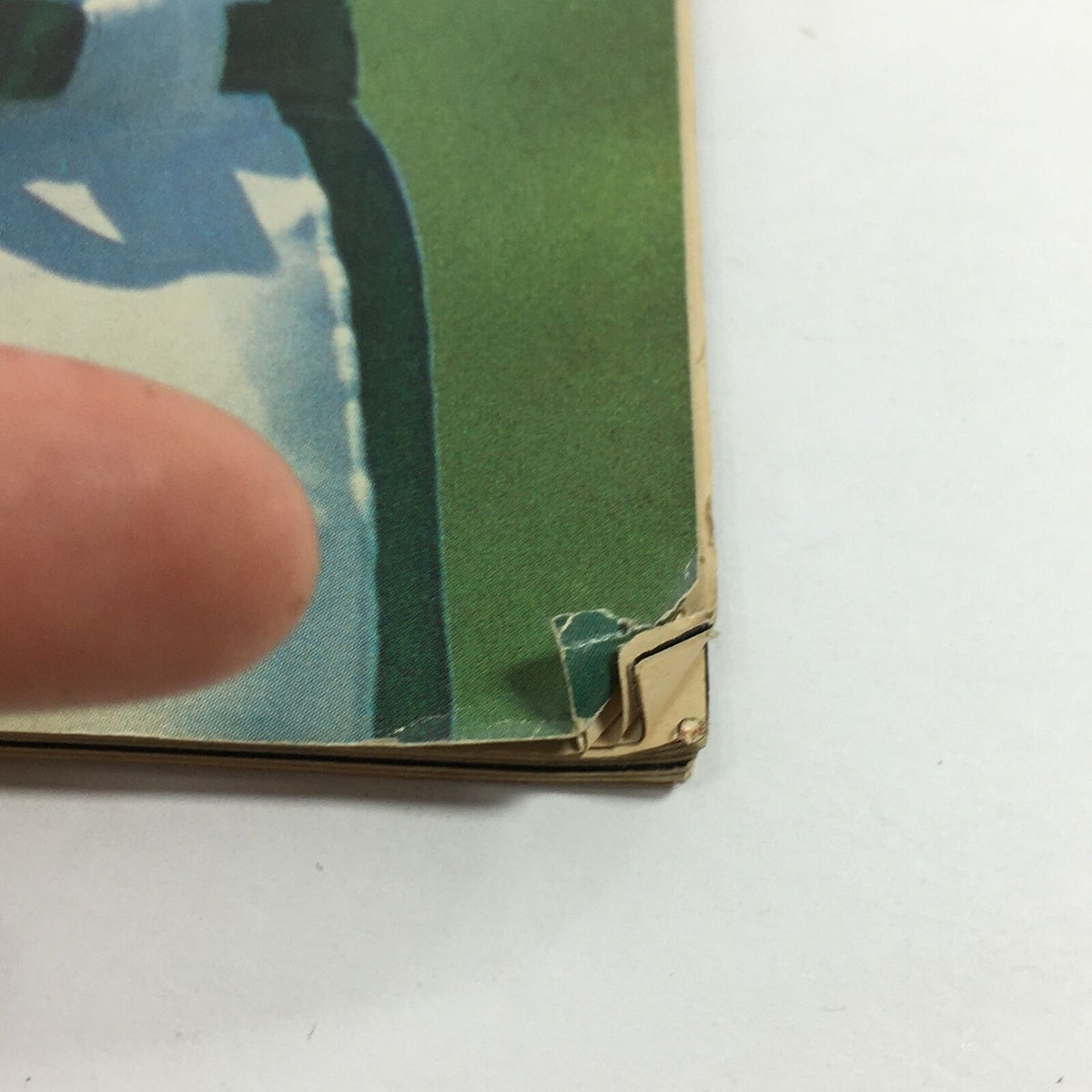 Close-up detail of the edge of the Sports Illustrated Magazine from August 1, 1983, highlighting minor wear and age flaws on the cover.