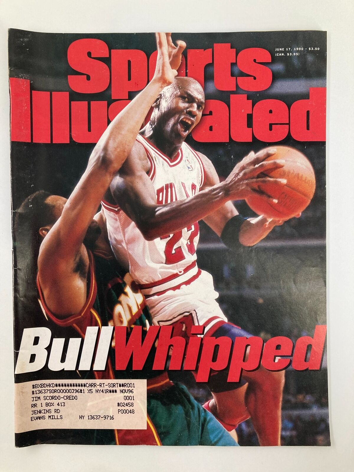 Sports Illustrated Magazine cover from June 17, 1996, featuring Chicago Bulls player Michael Jordan in action, captioned 'Bull Whipped'. A collectible piece of sports history showcasing the excitement of the NBA season.