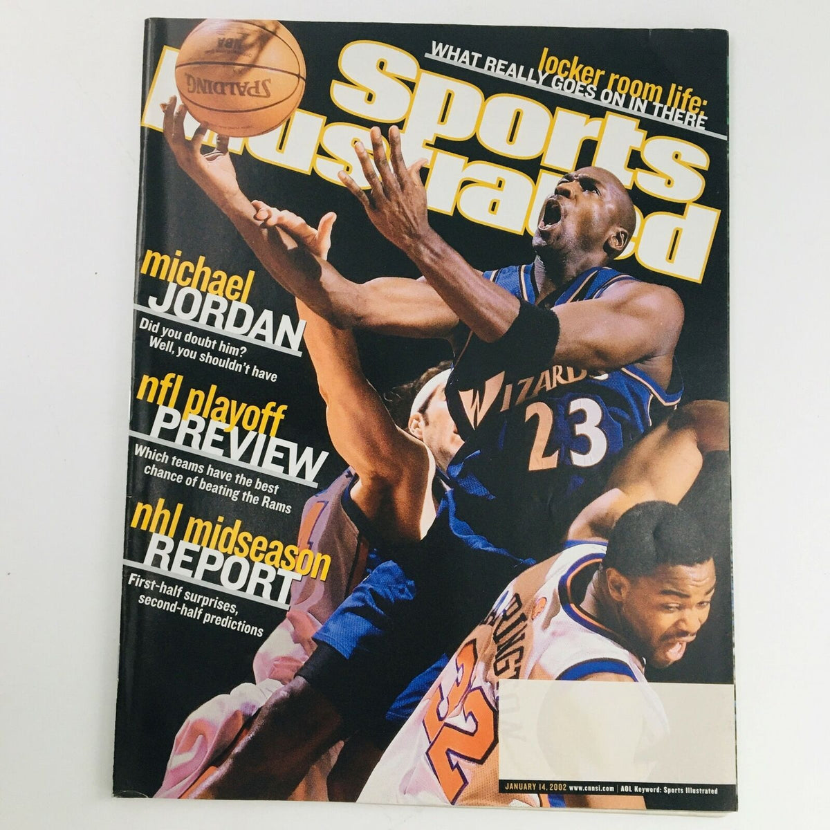 Cover of Sports Illustrated Magazine January 14 2002 featuring Michael Jordan and Othella Harrington, showcasing Jordan in action during a basketball game.