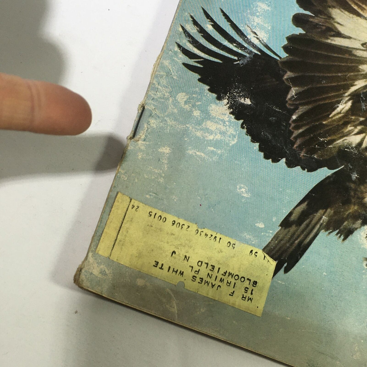 Detailed look at the back corner of the VTG Sports Illustrated Magazine June 29 1959, displaying a label and signs of age on the cover, enhancing its vintage appeal.