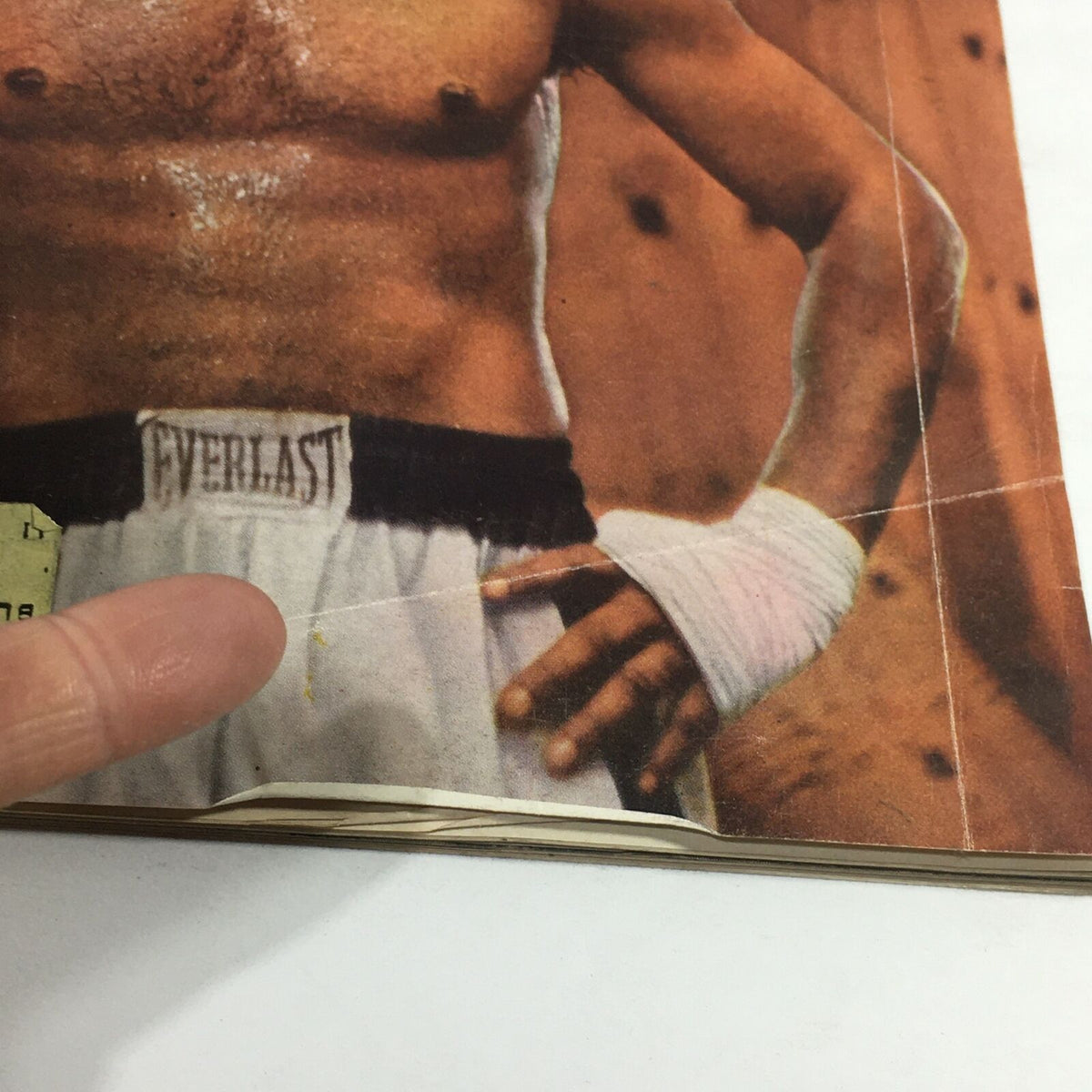 Close-up image of the VTG Sports Illustrated Magazine dated July 29, 1957, highlighting the Everlast waistband worn by Floyd Patterson in the boxing preview against Julian Jackson.