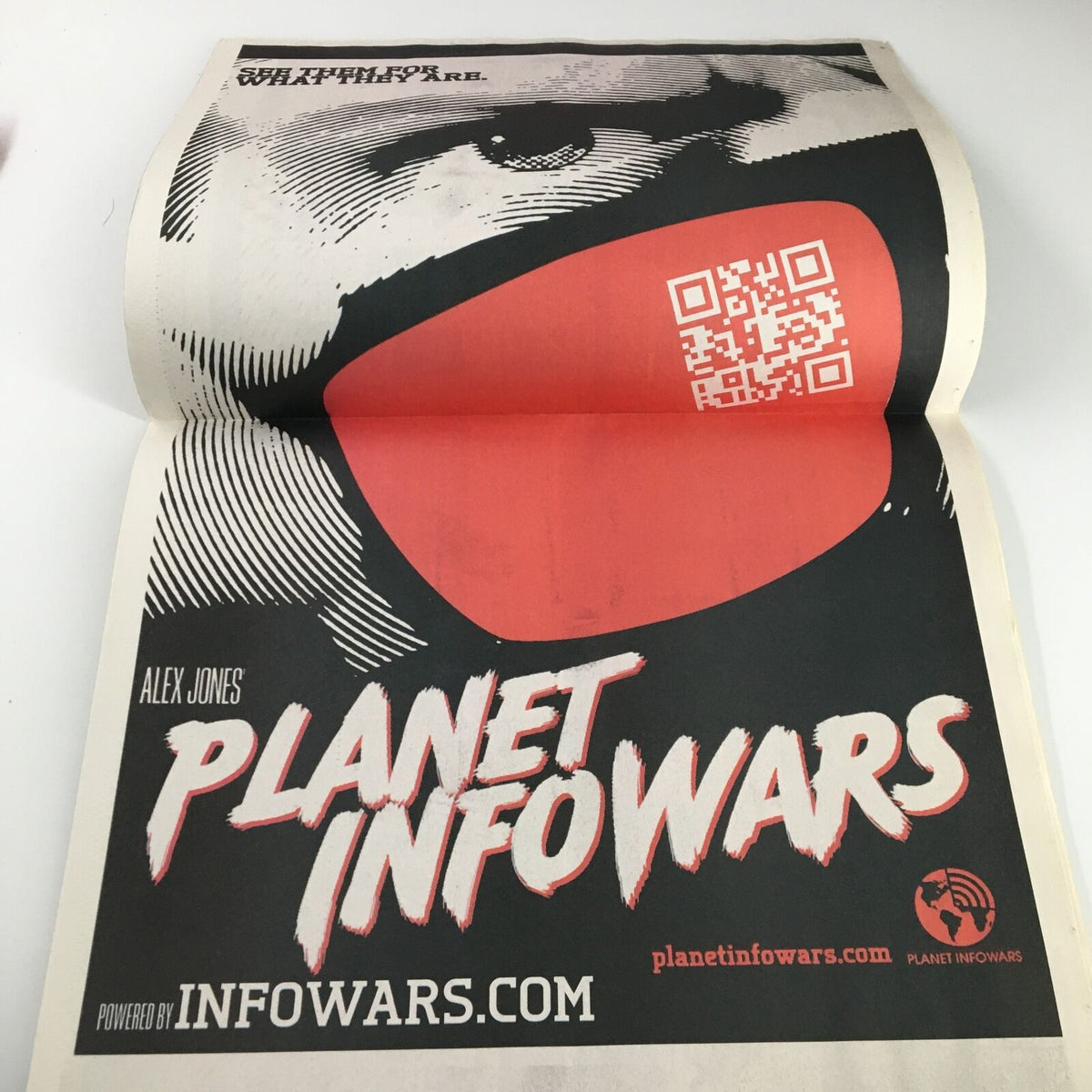 Advertisement for Planet Infowars in Infowars 1st Edition Magazine September 2012, showcasing online resources and updates.