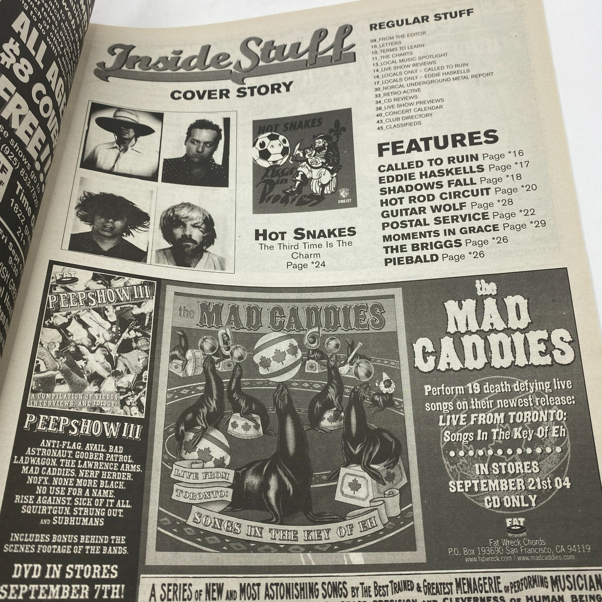 Interior page of Zero Magazine from September 10, 2004 highlighting the cover story on Hot Snakes, alongside features and regular segments, displaying promotional content related to indie music.