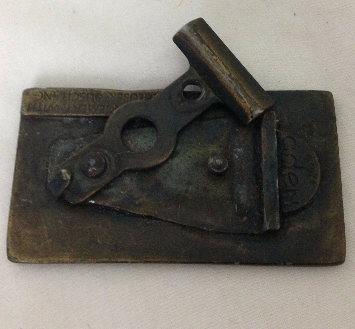Back view of the Vintage 1974 Budweiser Anheuser-Busch beer belt buckle showcasing its unique clasp mechanism and craftsmanship.
