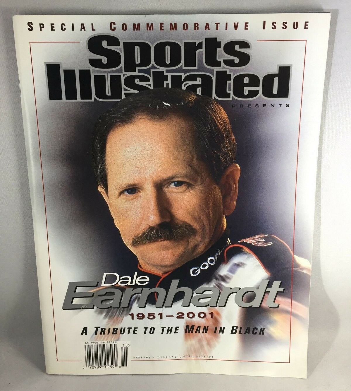 Front cover of 2001 Sports Illustrated No Label Special celebrating Dale Earnhardt, a tribute to the man in black with dates 1951 - 2001.