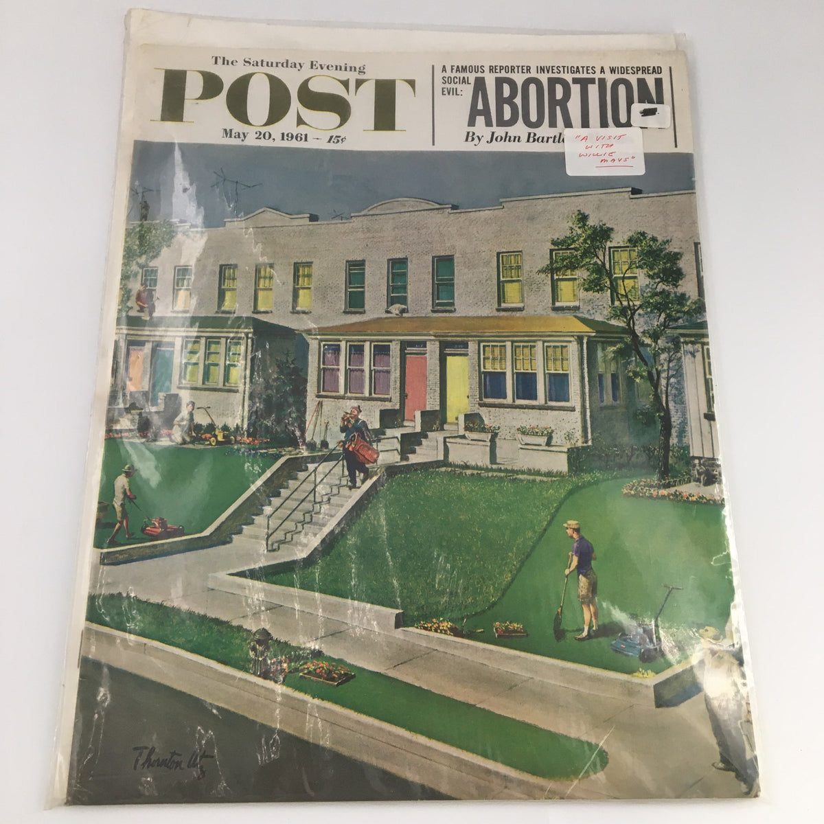 The Saturday Evening Post May 20, 1961 cover depicting suburban scenes, featuring the article 'Abortion' by John Bartlow Martin, with noted wear and protective plastic covering.