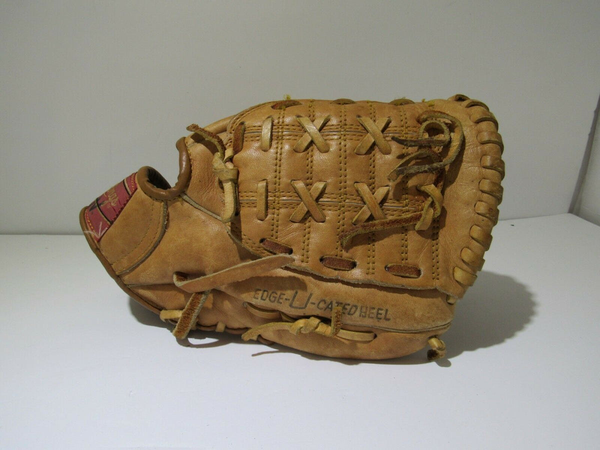 Vintage Rawlings Reggie Jackson Baseball Glove 8435 Ball Mitt angled view emphasizing the unique lacing and vintage leather texture.