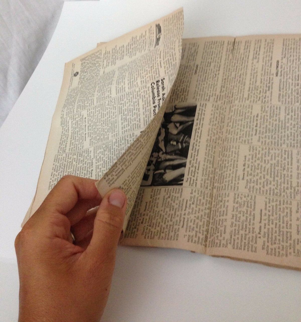 Inside pages of Down Beat Magazine showing articles and content related to the music scene from November 18, 1953, featuring Guy Mitchell and Liberace.