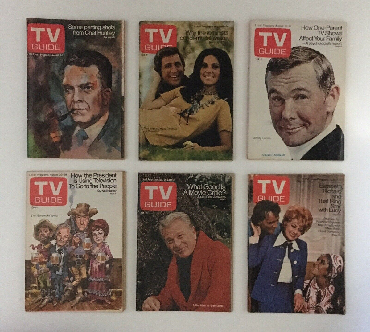 TV Guide magazines from 1970 highlighting popular topics such as Chet Huntley, the influence of television, and featuring Johnny Carson, included in the Complete Year Of TV Guide Magazines 1970.