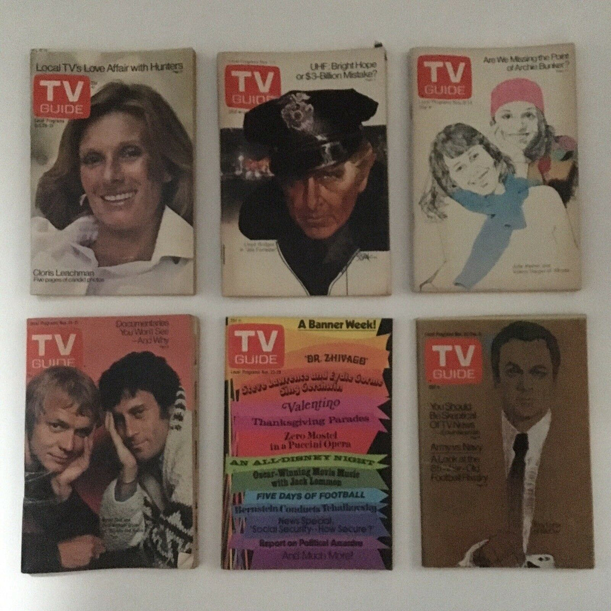 Collection of Complete Year of TV Guide Magazines 1975 showcasing covers on local TV affairs and documentary discussions.