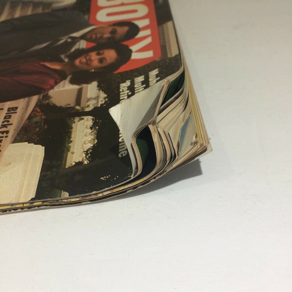 Side view of the slightly worn March 1982 Ebony Magazine, illustrating its age and charm, with visible dog-eared pages. Title: 1982 March Vintage Ebony Magazine 1982, Muhammad Ali, Black vtg.