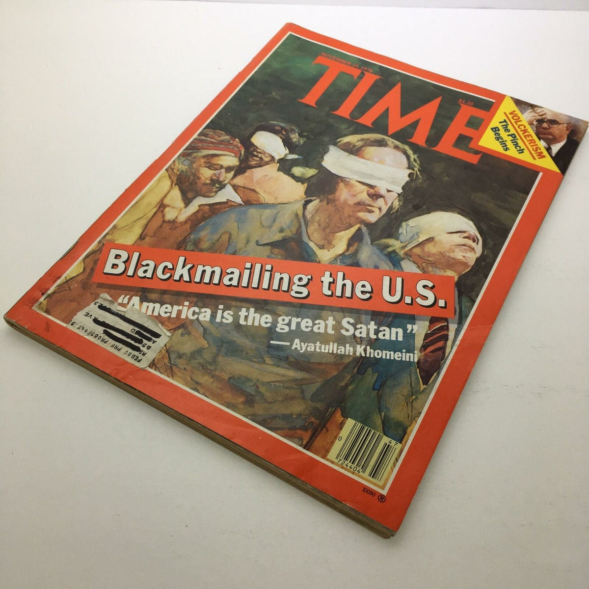 Cover of Time Magazine from November 19, 1979, titled 'Blackmailing the U.S: Ayatullah Khomeini', depicting a significant historical moment in U.S.-Iran relations.