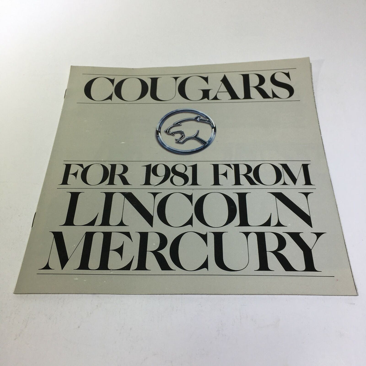 Cover of the 1981 Lincoln-Mercury Cougars XR-7 Inspired Sedan 3.3 Liter AT Car Sale Brochure, featuring the words 'Cougars for 1981 from Lincoln Mercury' and the logo.