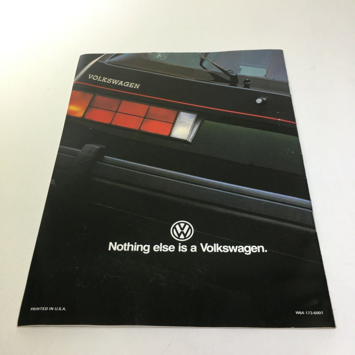 Cover of the 1983 Volkswagen Rabbit GTI 2-Door Sedan Car Sale Brochure featuring the rear of the vehicle with the Volkswagen logo and slogan 'Nothing else is a Volkswagen.'