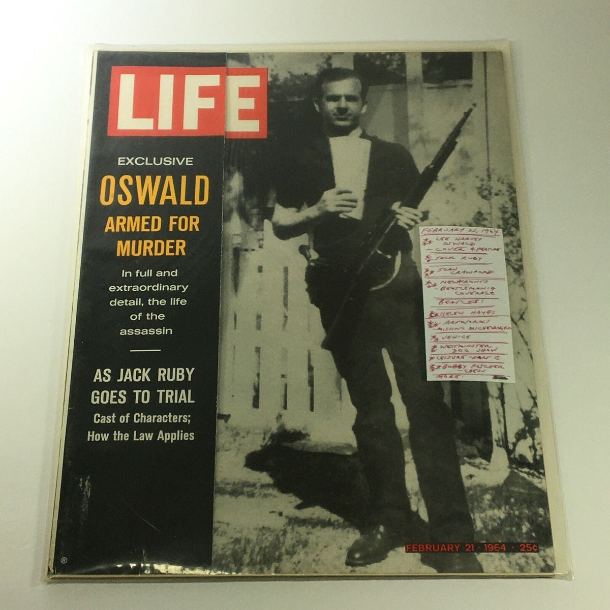 VTG Life Magazine February 21 1964 featuring Lee Harvey Oswald on the cover, showcasing the headline 'Exclusive Oswald Armed for Murder' and details about Jack Ruby's trial.