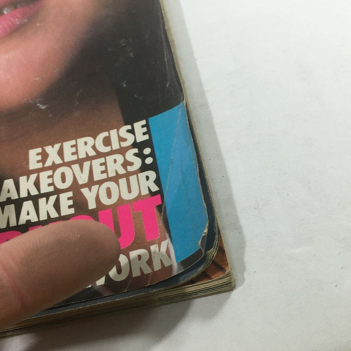 Detailed view of the bottom corner of the cover of VTG Mademoiselle Magazine January 1983, revealing a section about exercise makeovers and additional magazine features.