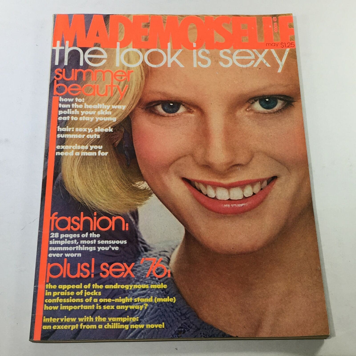 VTG Mademoiselle Magazine: May 1976 featuring a close-up of a model with blonde hair and blue eyes smiling, highlighting summer beauty trends and fashion in the 1970s.