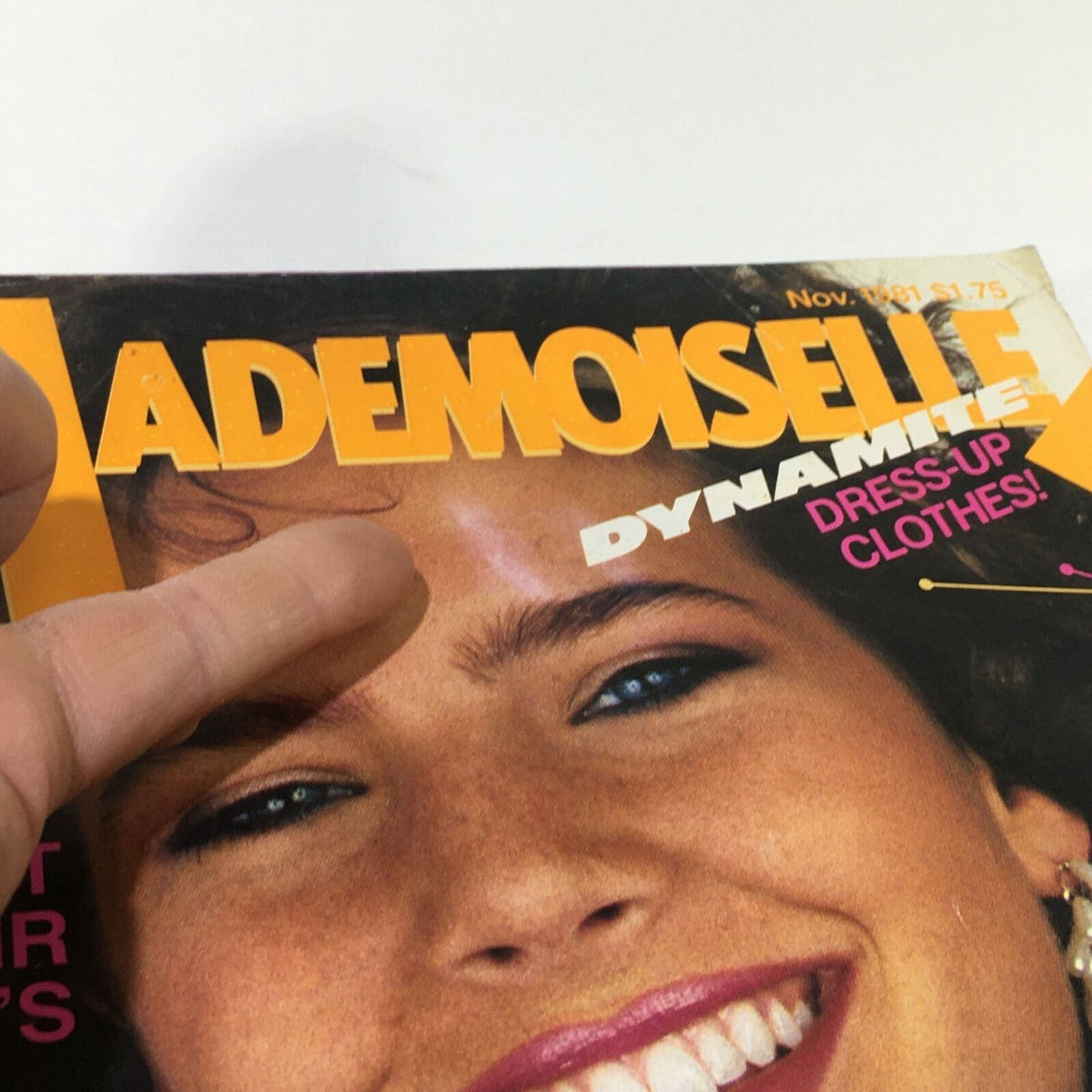 Close-up of the Vintage Mademoiselle Magazine cover from November 1981, highlighting the magazine's title and features like 'DYNAMIC DRESS-UP CLOTHES!'