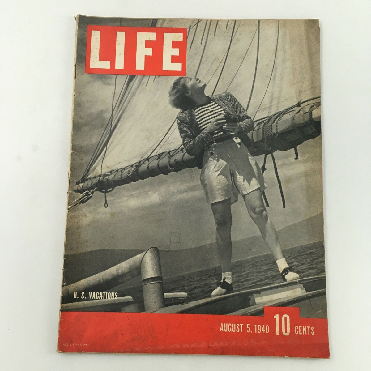 Cover of VTG Life Magazine August 5 1940 featuring a woman on a sailboat, highlighting U.S. vacations, in vintage condition.