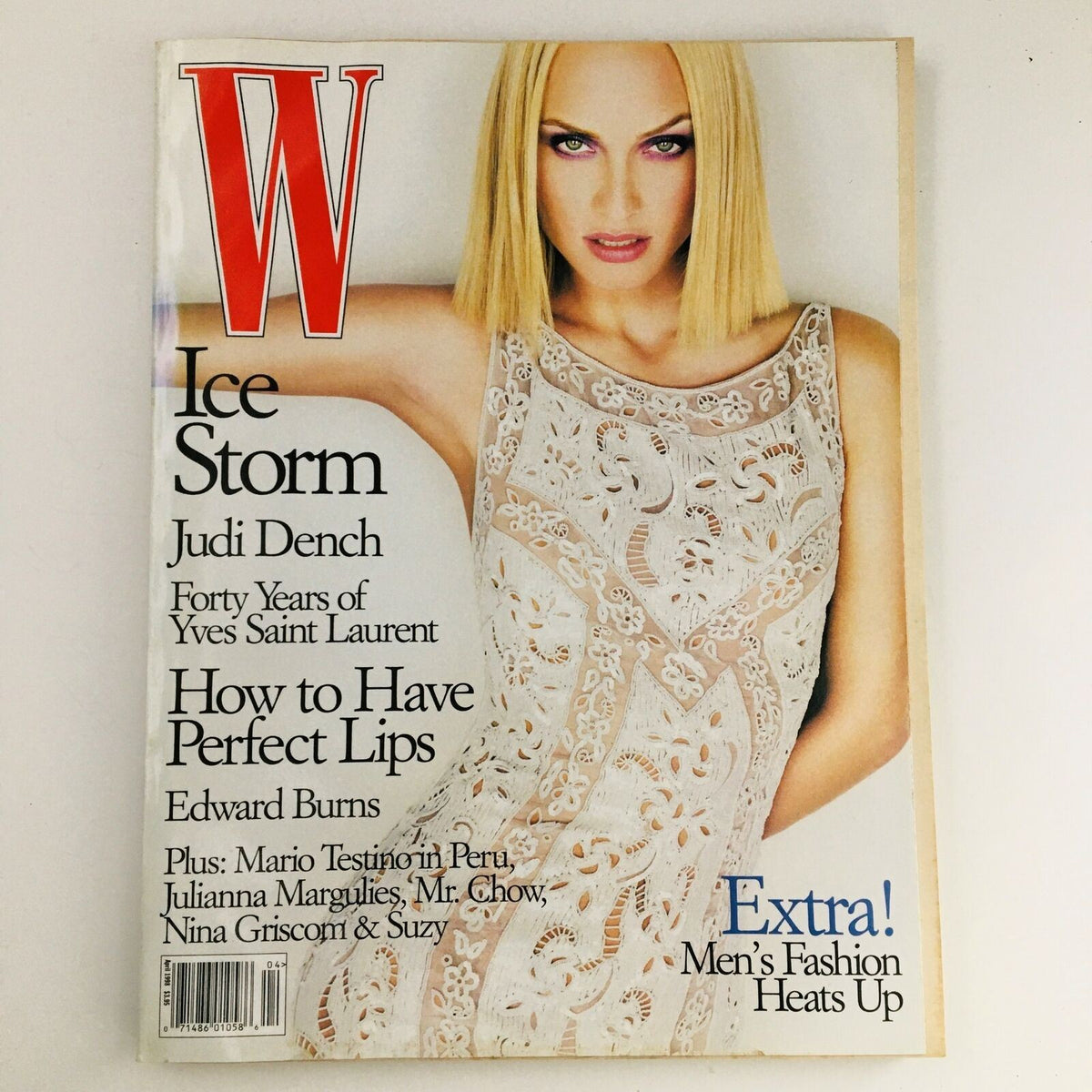 W Magazine April 1998 issue featuring model Amber Valletta on the cover, highlighting the Ice Storm theme and featuring actress Judi Dench. The cover showcases fashion trends of the late 90s with an elegant design.
