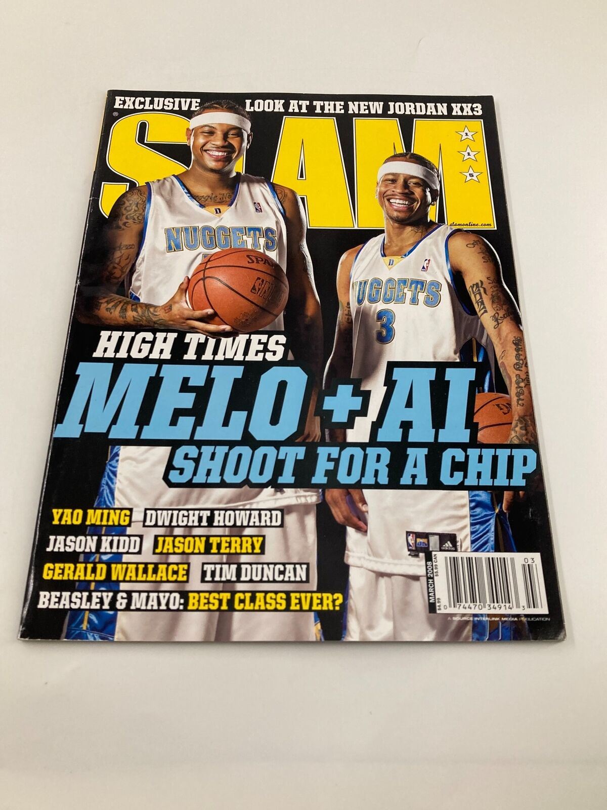 Slam Magazine March 2008 cover displaying NBA icons Carmelo Anthony and Allen Iverson with a focus on their journey and ambition for championship success. The colorful design captures the essence of basketball culture in the late 2000s.