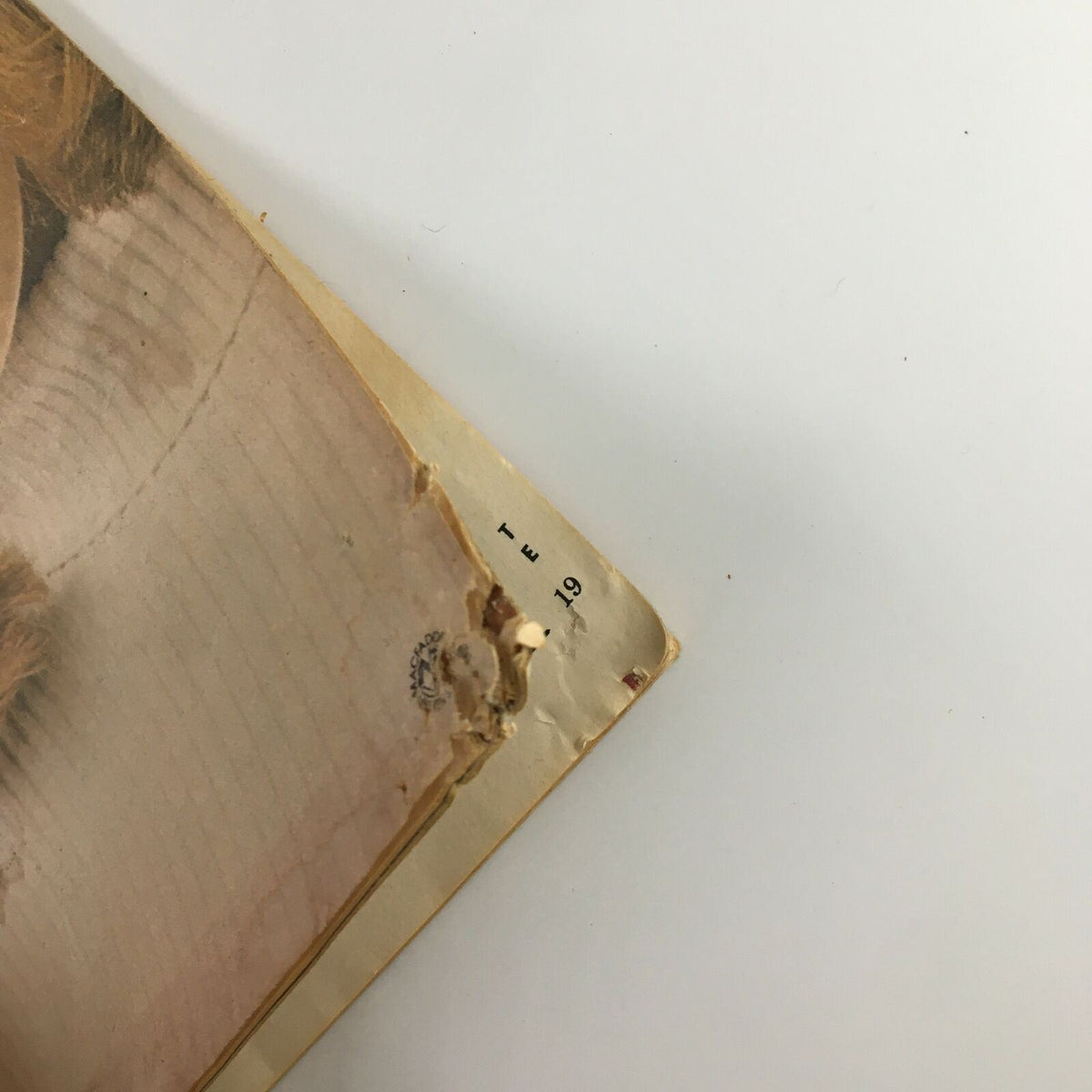 Close-up view of True Experience Magazine April 1976 showing the back cover with minor wear and tear, reflecting its vintage condition.
