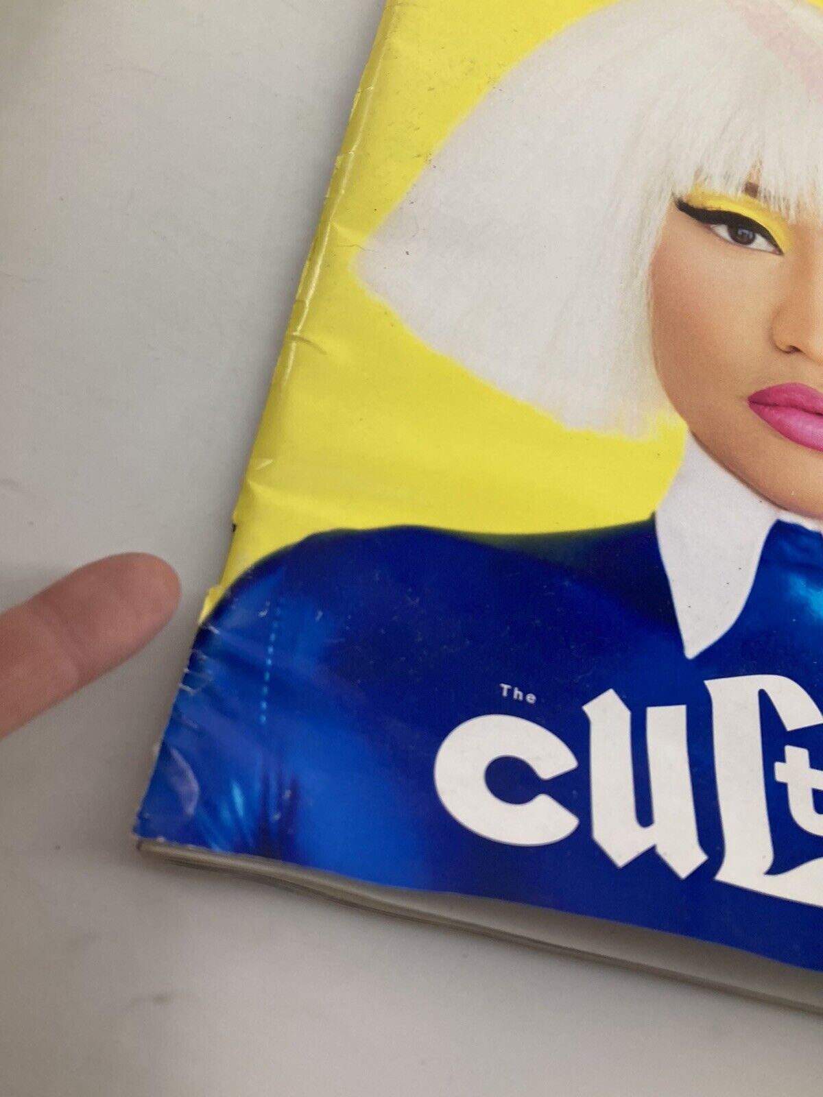 Detail view of The New York Times Magazine cover from October 11, 2015, featuring Nicki Minaj in vibrant colors with the title 'The Culture Issue' visible.