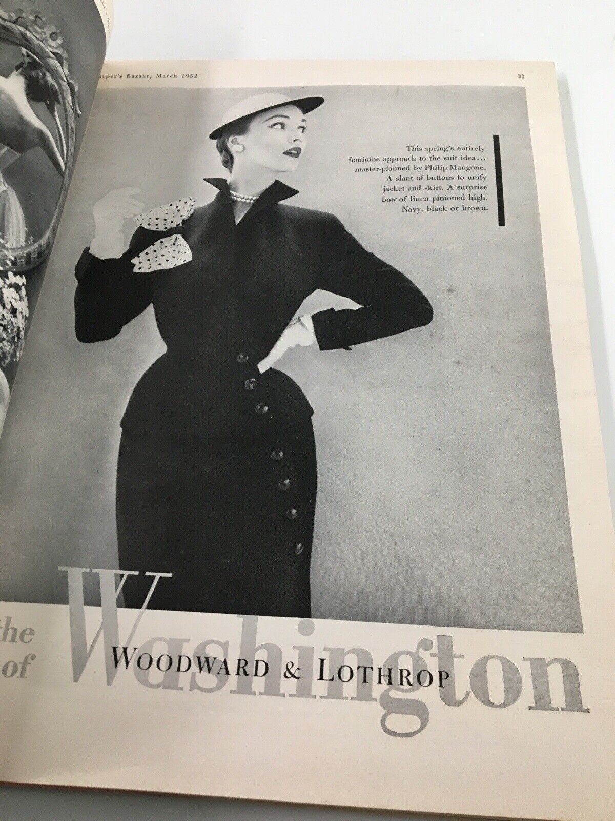 Fashion imagery from Harper's Bazaar March 1952 showcasing a model in a classic outfit, paired with a stylish hat and accessories, representing 1950s fashion.