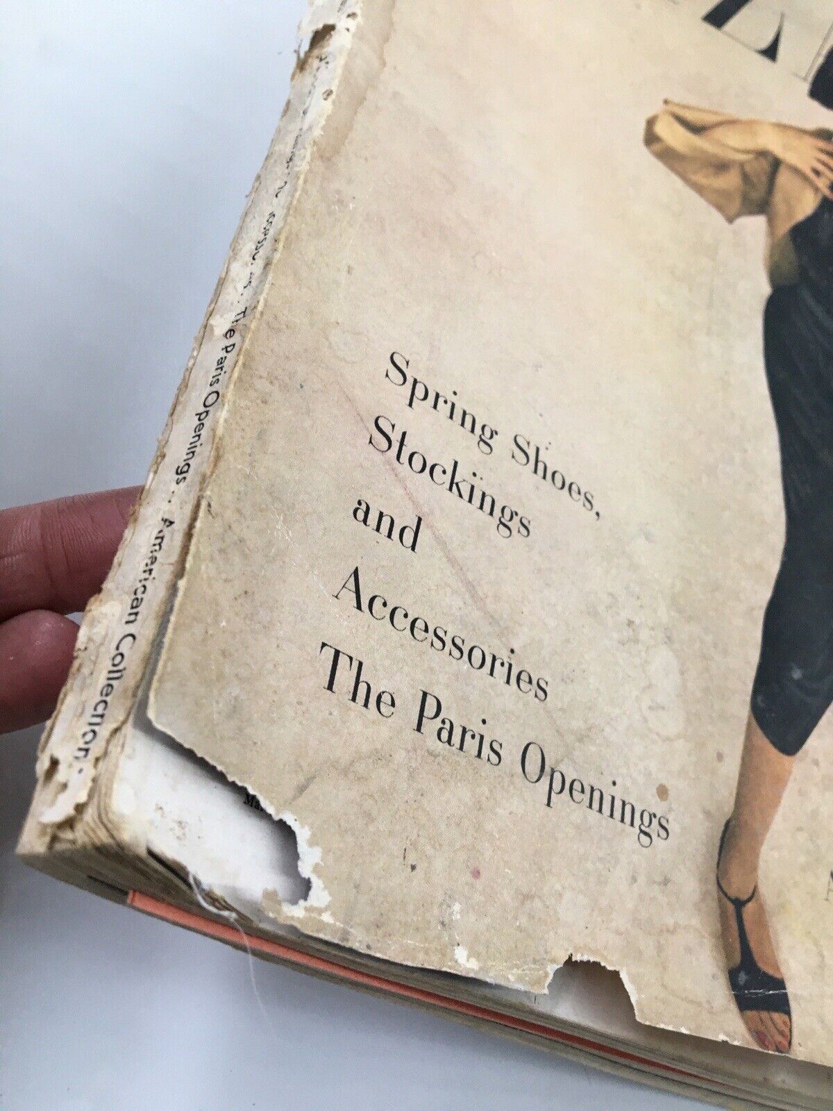 Image showing the edge of the March 1952 Harper's Bazaar magazine, highlighting the text 'Spring Shoes, Stockings and Accessories The Paris Openings' with visible wear. Perfect for fashion history enthusiasts.