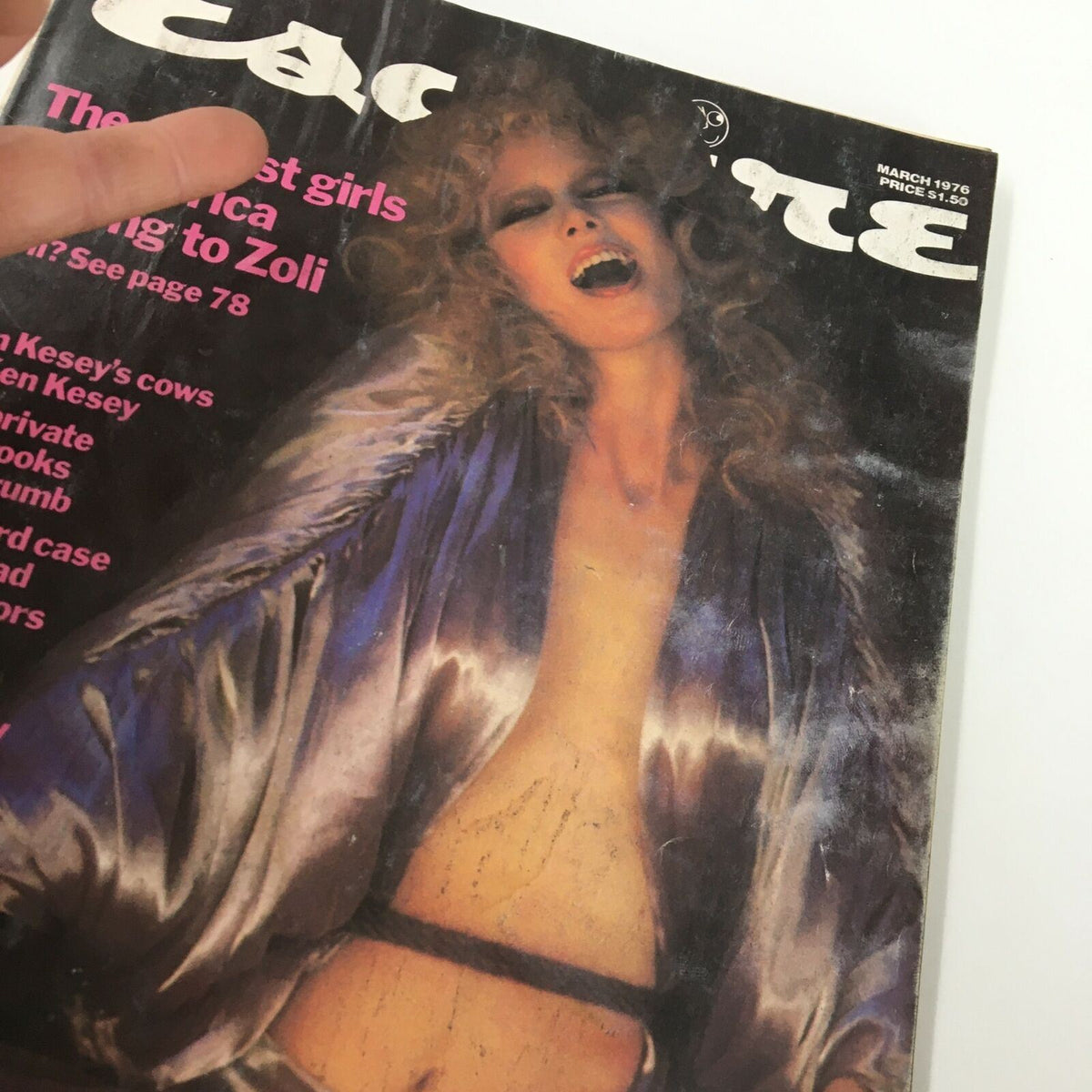 Close-up of the March 1976 Esquire Magazine cover, highlighting the text 'The Sexiest Girl in America Belong to Zoli', along with the model's stylish appearance.