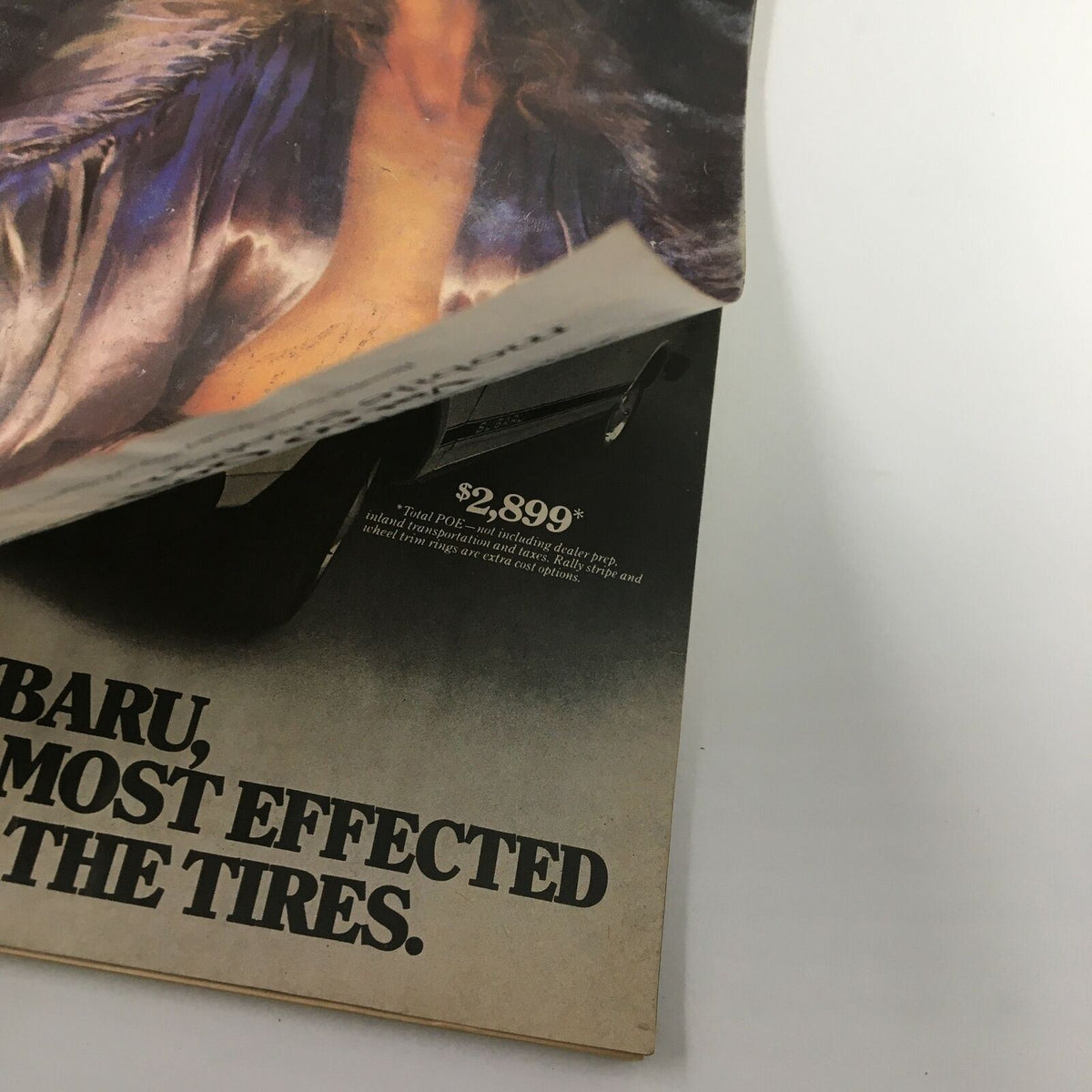 Back view of the March 1976 Esquire Magazine, focusing on an advertisement and some wear typical for its vintage condition.