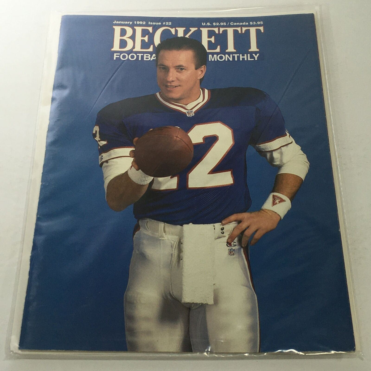Beckett Football Card Monthly: January 1992 Issue #22 featuring Jim Kelly from the Buffalo Bills, showcasing the iconic cover with Kelly in uniform and holding a football.