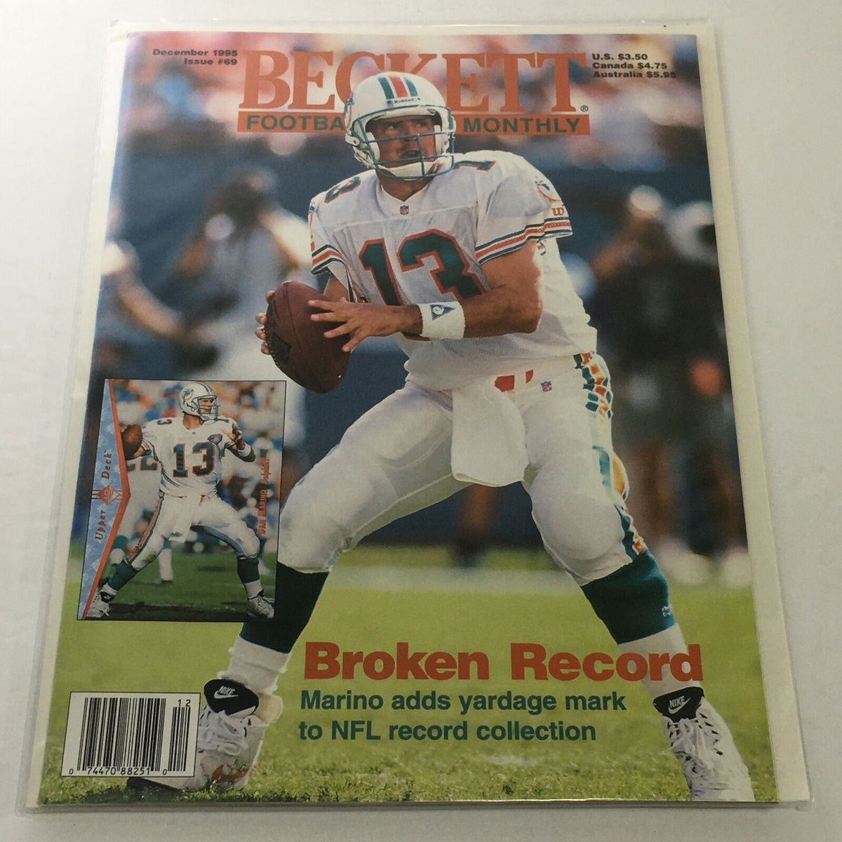 Beckett Football Card Monthly: December 1995 Issue #69 cover featuring Dan Marino of the Miami Dolphins, showcasing a dynamic action shot of Marino in his football uniform, celebrating a record achievement.