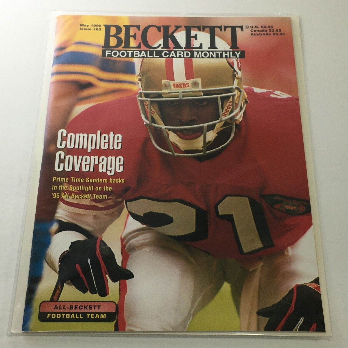 Beckett Football Card Monthly: May 1995 Issue #62 featuring Prime Time Sanders on the cover, showcasing complete coverage of the '95 All-Beckett team in an excellent condition magazine.