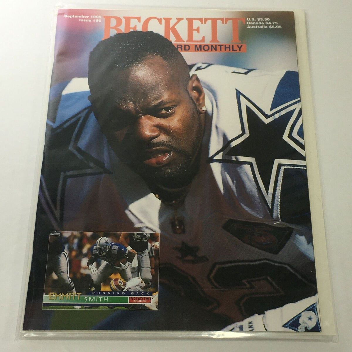 Beckett Football Card Monthly, September 1995 Issue #66 featuring Emmitt Smith on the cover, showcasing him in a Dallas Cowboys uniform with a football card of him at the bottom left corner.