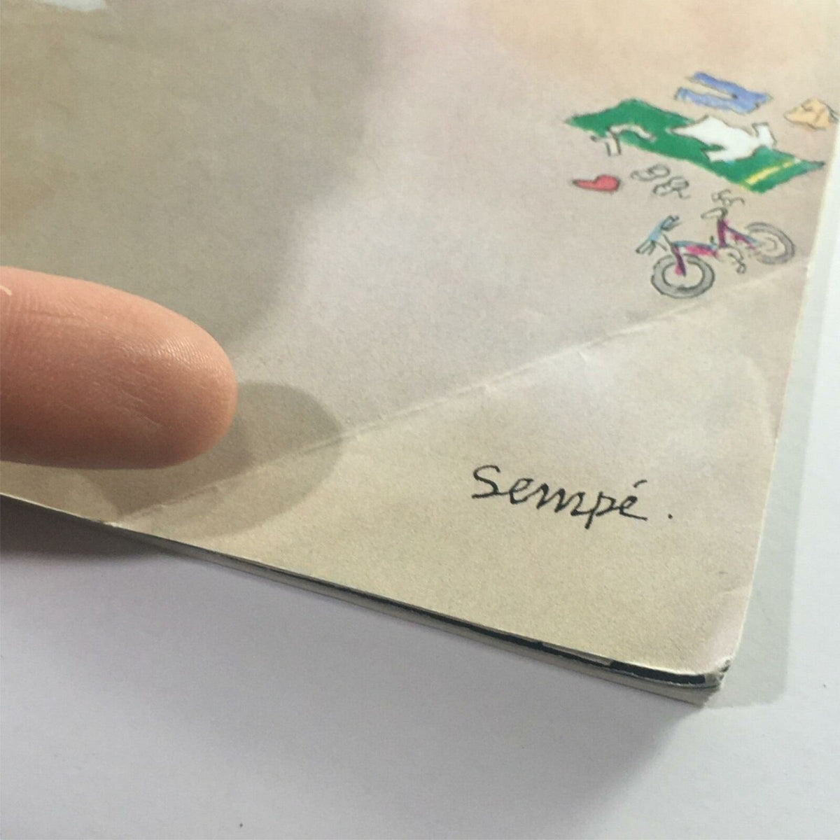 Close-up of Jean-Jacques Sempé's signature on the June 22 2009 cover of The New Yorker, highlighting the artistic detail and authenticity of the magazine.