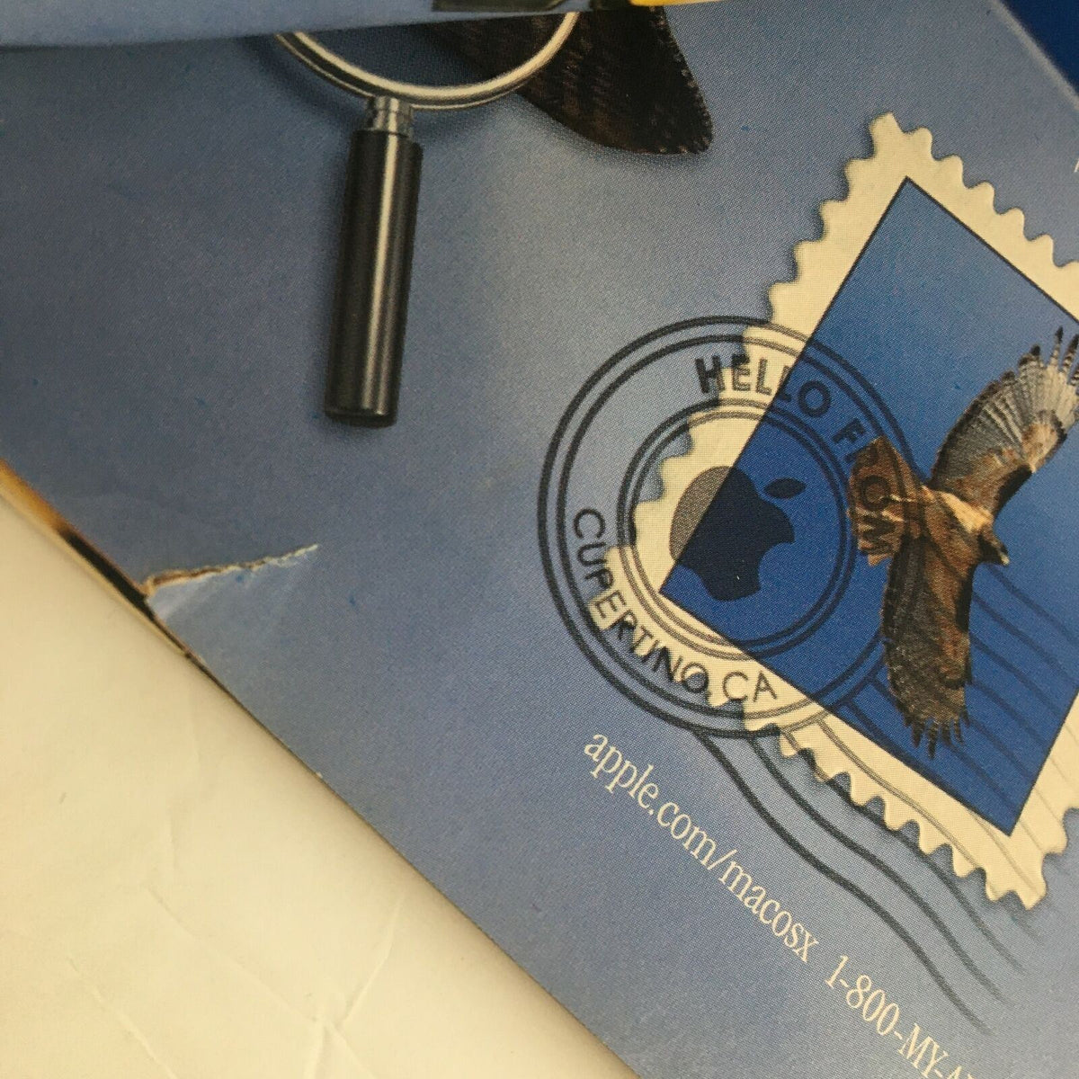 Back cover detail of The New Yorker Full Magazine November 4 2002 featuring an Apple advertisement with a bird stamp.