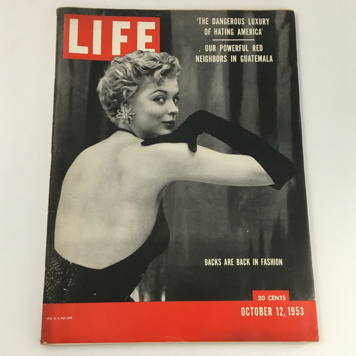 Cover of VTG Life Magazine dated October 12, 1953 featuring a fashion model in elegant attire. The magazine includes the tagline 'BACKS ARE BACK IN FASHION' and highlights articles on various topics.