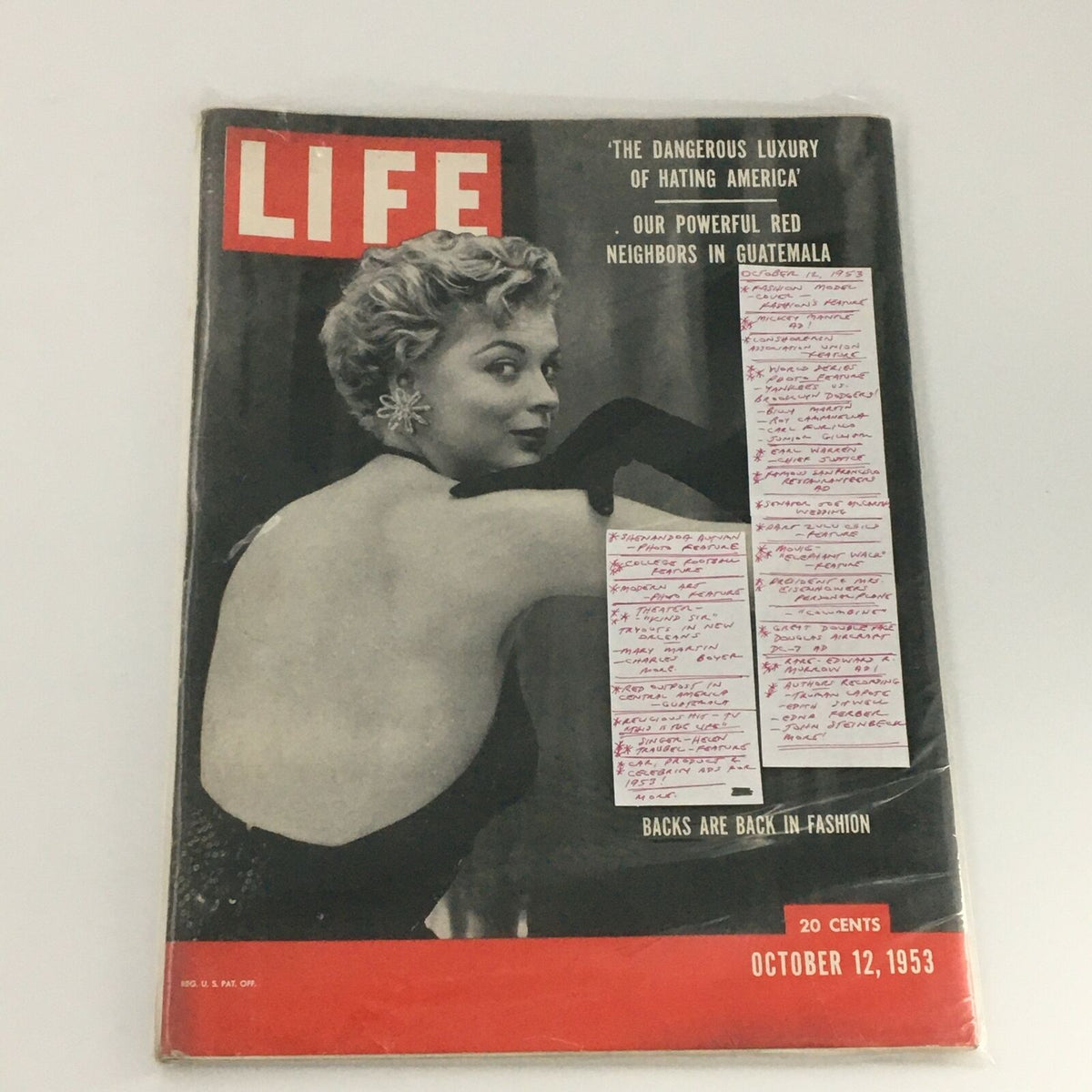 VTG Life Magazine dated October 12, 1953, cover showing a fashion model, partially covered with notes by a previous owner, emphasizing the magazine's vintage appeal and content features.