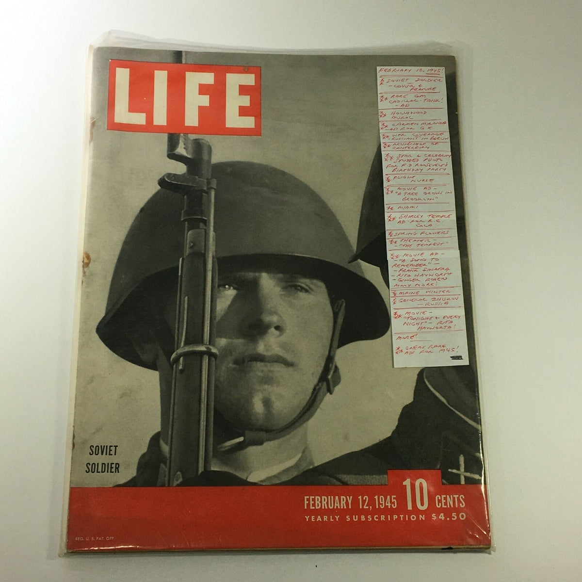 A preserved copy of VTG Life Magazine February 12, 1945 with notes detailing its content, emphasizing the featured Soviet soldier cover.