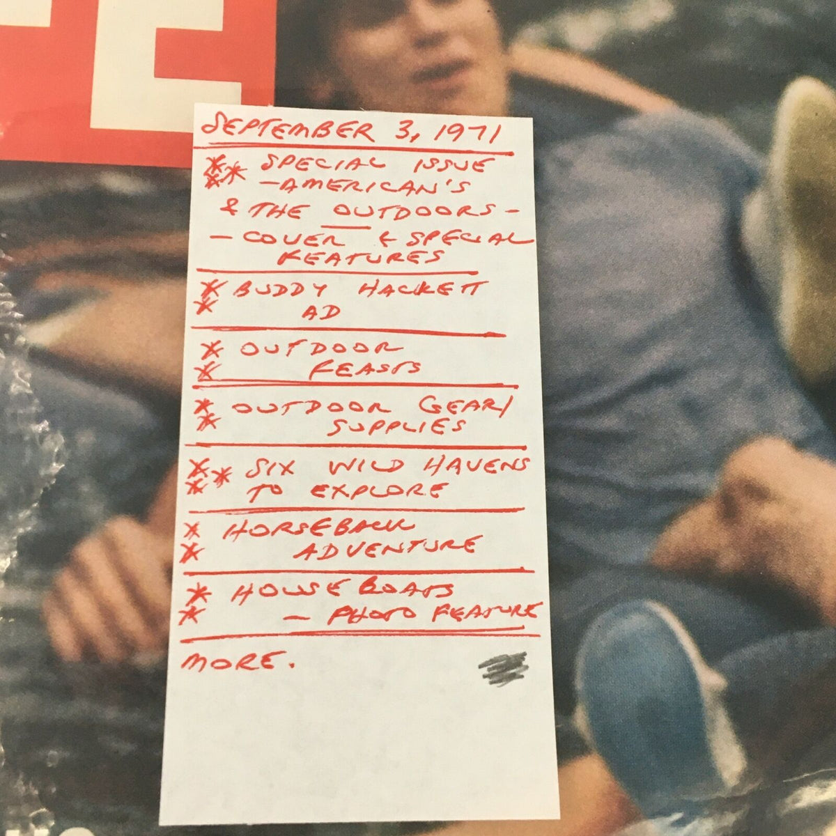 Close-up of a handwritten note on the VTG Life Magazine September 3 1971 listing key articles including 'Six Wild Havens to Explore' and outdoor adventures.