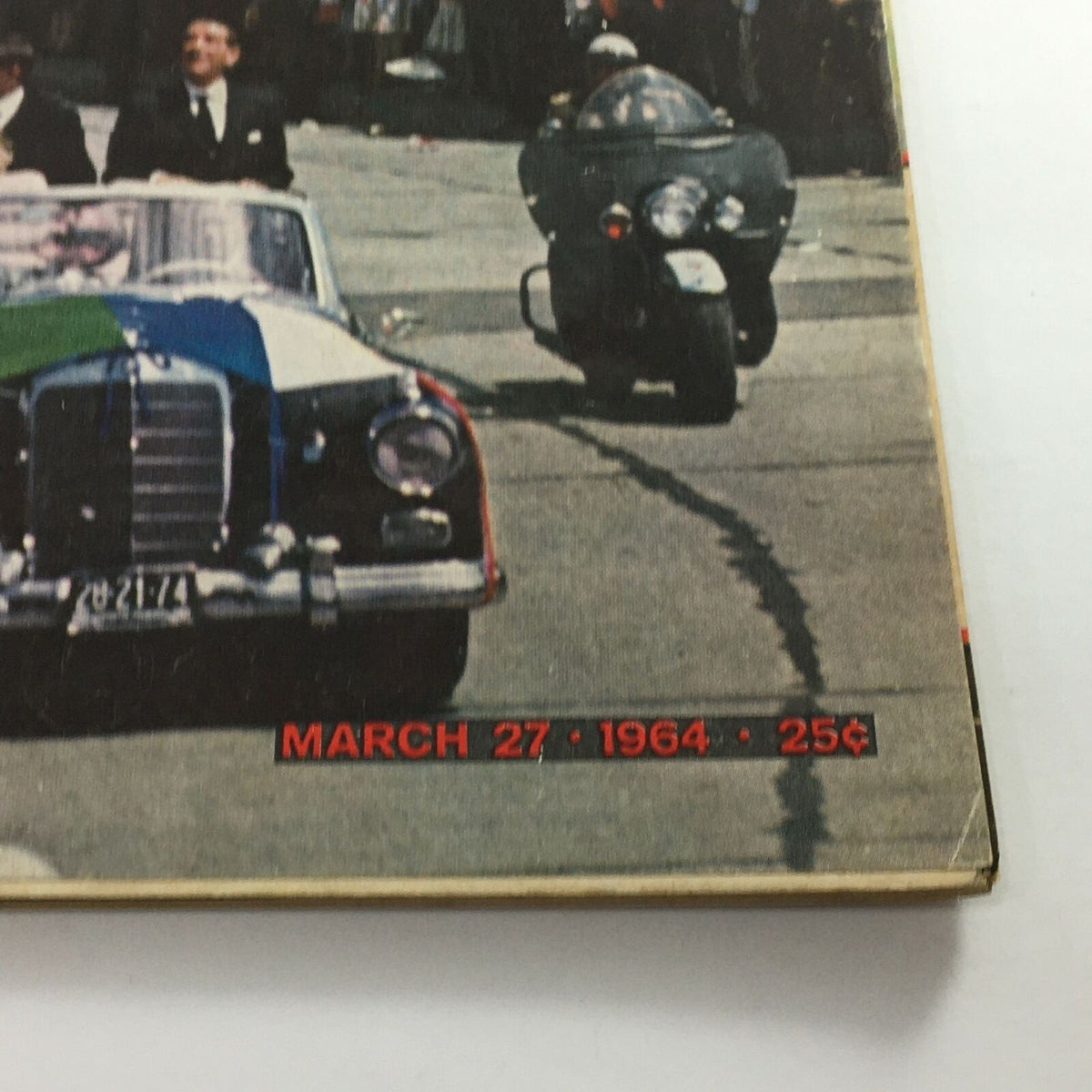 Back cover of the VTG Life Magazine March 27, 1964 displaying a vintage car with text indicating the publication date and price.