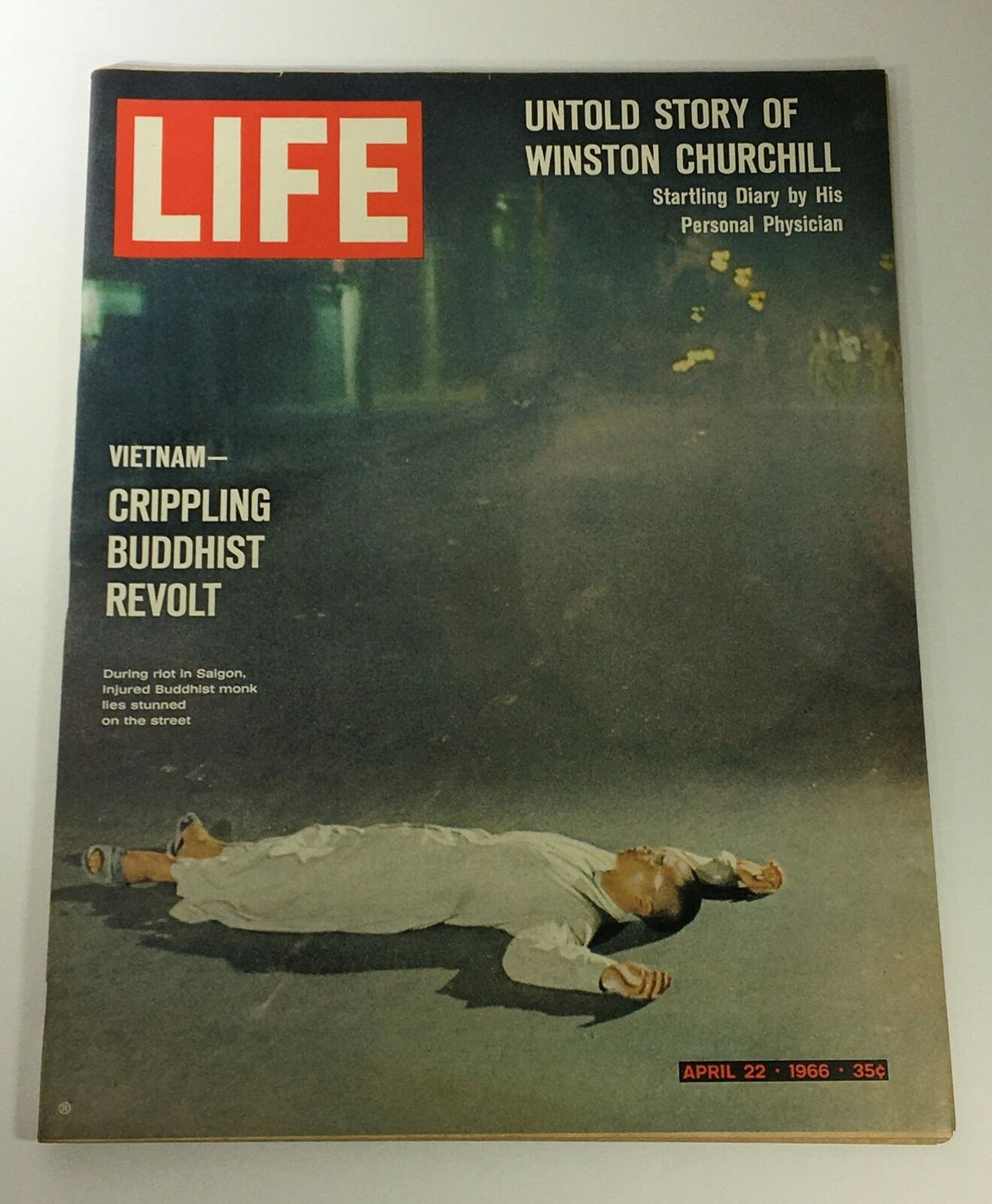 VTG Life Magazine April 22 1966 featuring the Vietnam Buddhist Revolt cover, showcasing an injured monk during a protest.