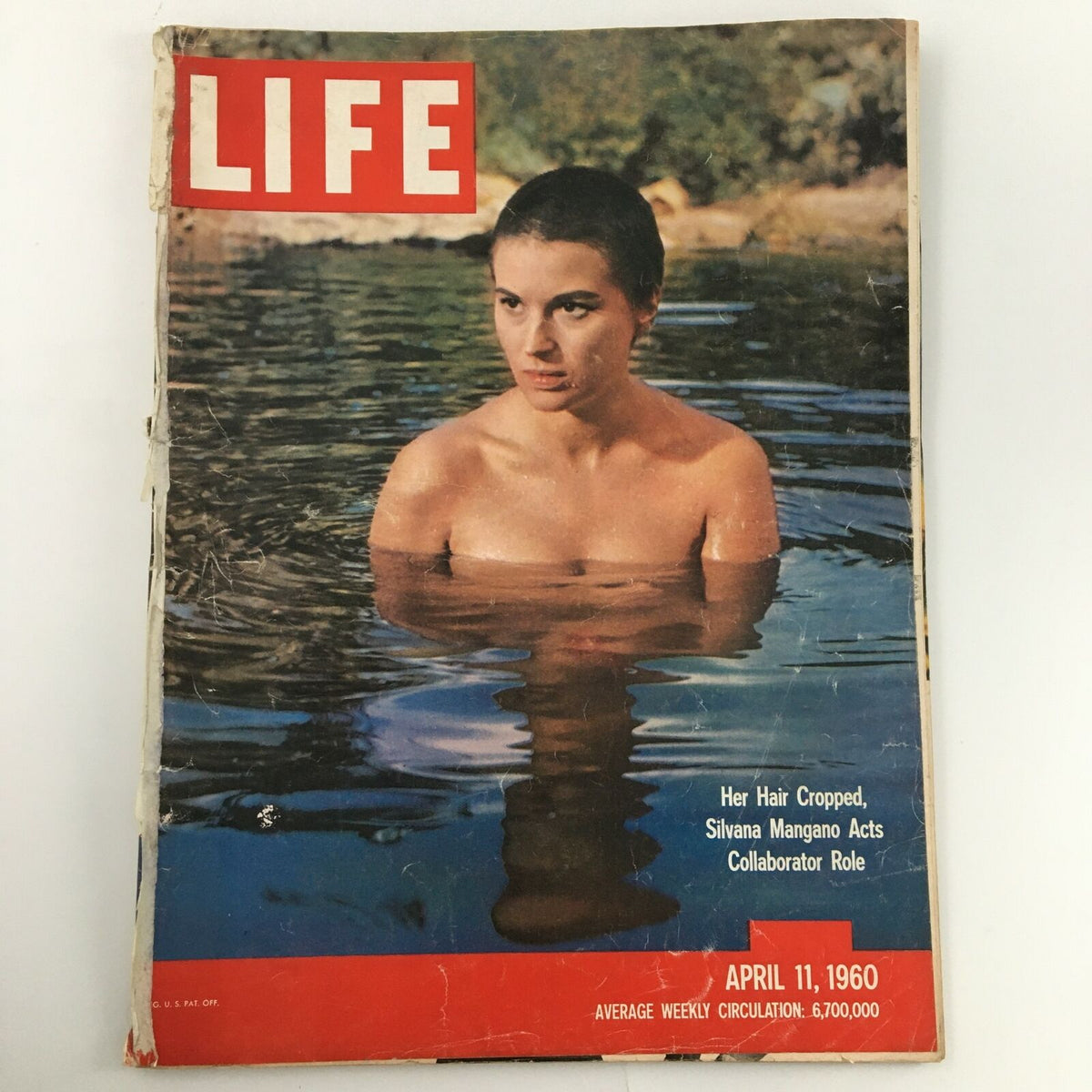 Cover of VTG Life Magazine April 11 1960 featuring Italian actress Silvana Mangano, showcasing a serene moment in water with an iconic vintage aesthetic.
