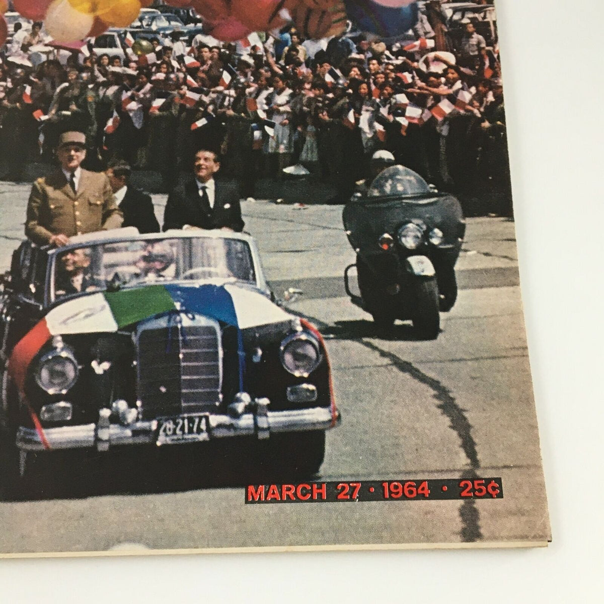 Close-up of VTG Life Magazine March 27 1964 cover featuring Charles de Gaulle in a decorated car during a parade, with the date prominently displayed.