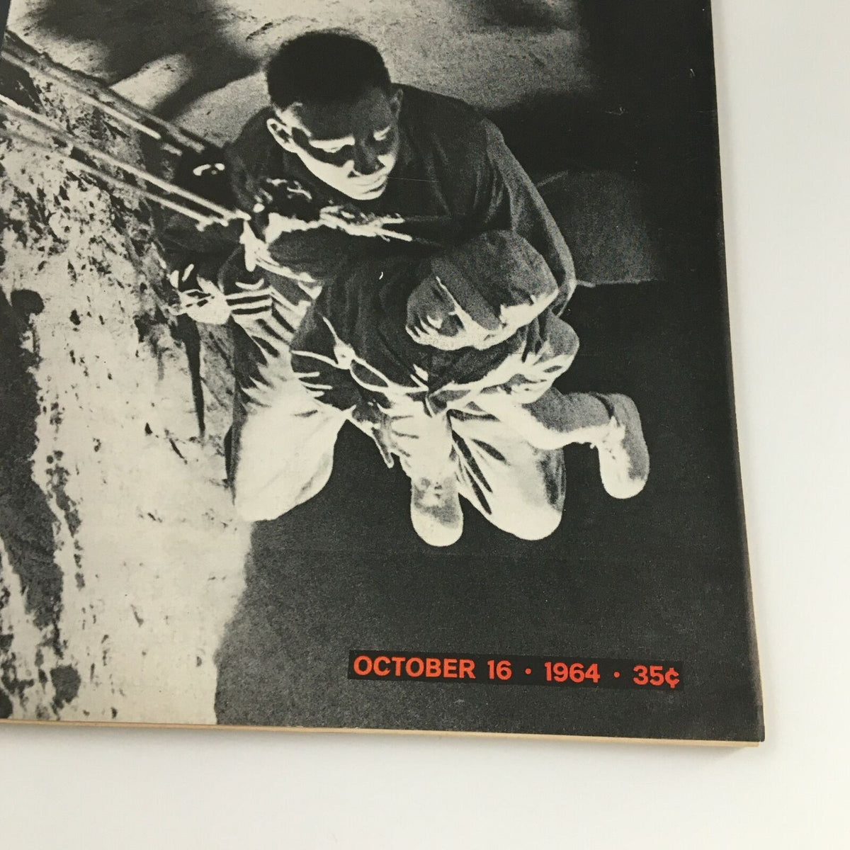 Vintage Life Magazine October 16 1964 cover featuring the Berlin Tunnel Escape story, showcasing a dramatic black and white photograph.